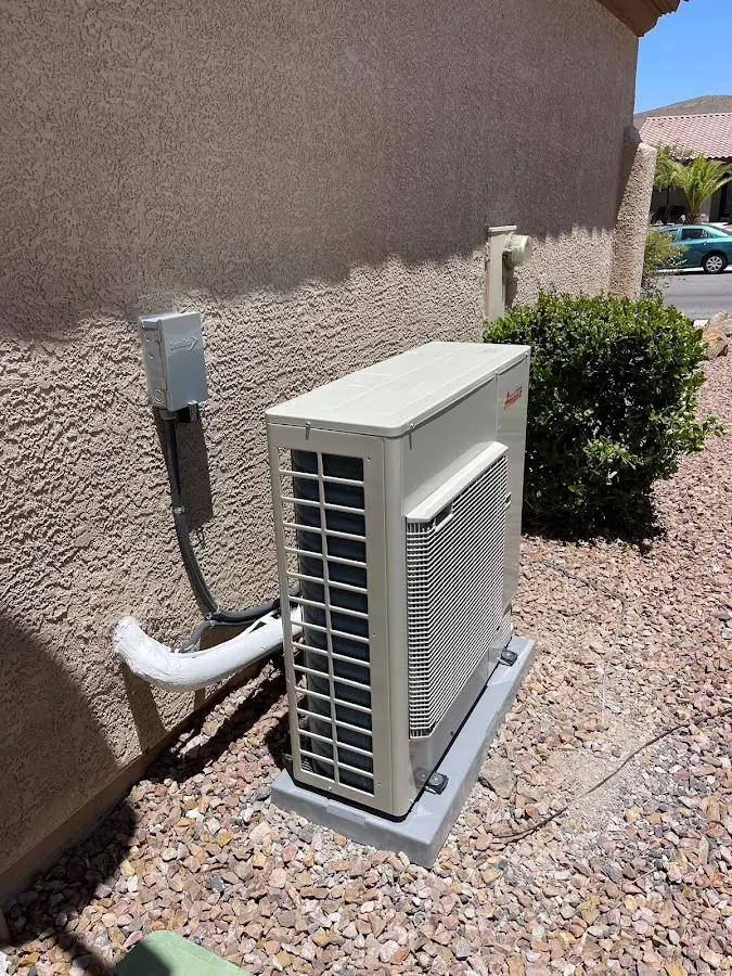 Residential air conditioning condenser unit in Garrett